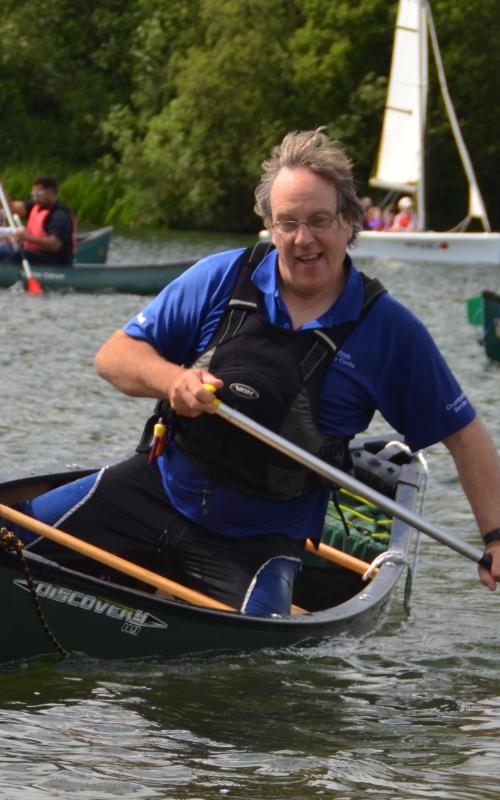 instructor in a canoe