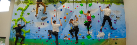 Children climbing the indoor wall at Dinton Activity Centre